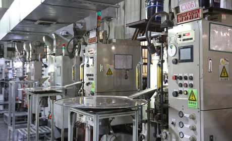 Powder compaction press in the manufacturing line